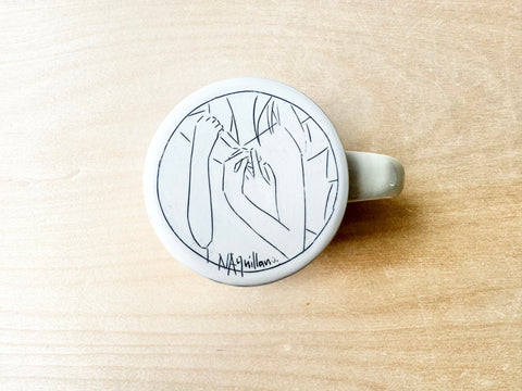 Hug & flower w/sun mug (12 oz)