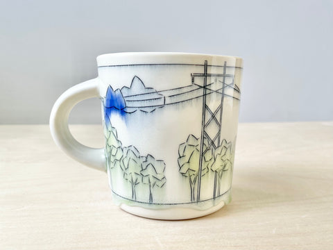 Tranmission lines, trees & blue clouds mug (16 oz)