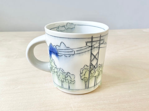 Tranmission lines, trees & blue clouds mug (16 oz)
